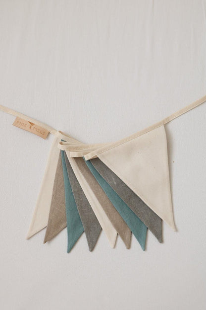 Linen pendants in neutral cream, grey and teal tones