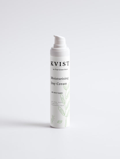 A white pump bottle of KVIST Moisturising Day Cream with black text and light green leaf illustrations, set against a clean white background.