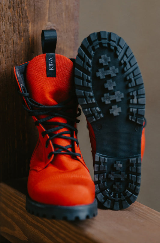 Bottom view of the red KIRA 5.0 sustainable sneakers, crafted from 100% vegan and eco-friendly materials.