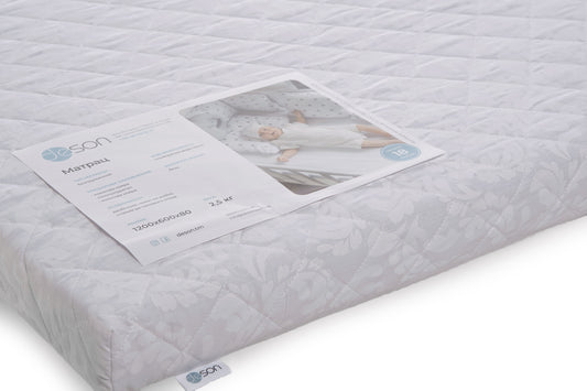 Close-up detail of the soft, zippered cover on the KOTTO Dreemsy mattress