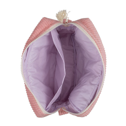 Interior view of the Baby Pink travel organizer with spacious pockets