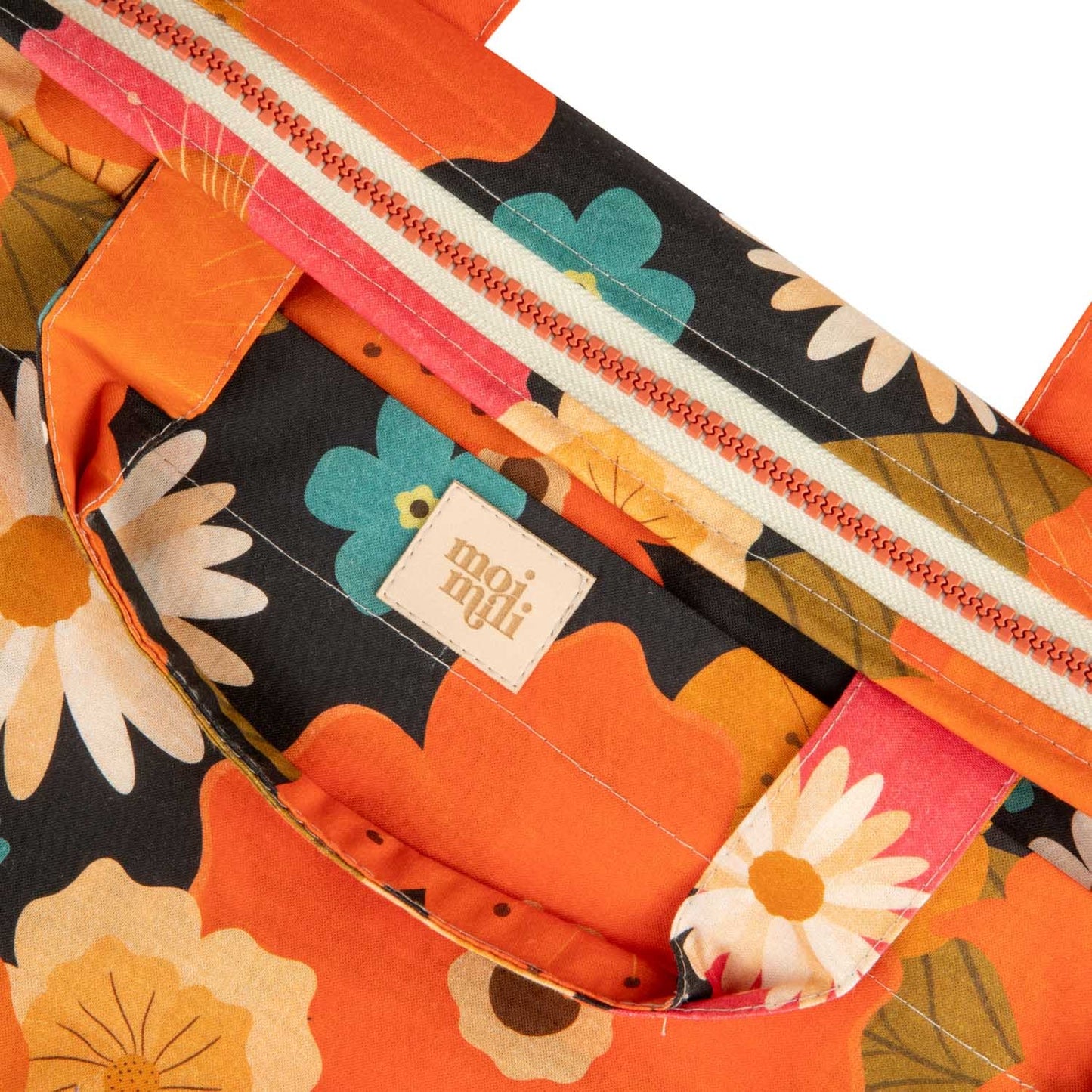 Close-up of the delicate Picnic With Flowers pattern and premium zipper