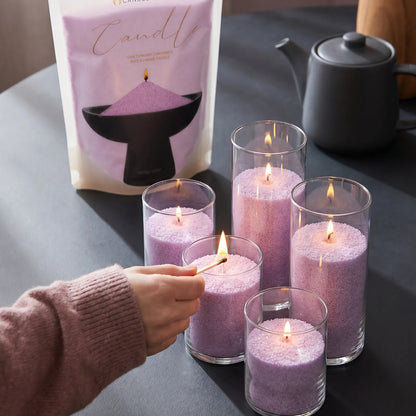 Close-up of a woman's hand lighting the cotton wick of a Lilac pearled sand candle