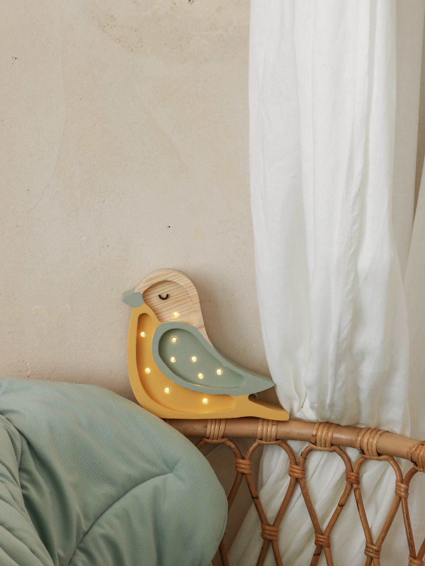 Small dimmable wooden bird nightlight for a kids bedroom