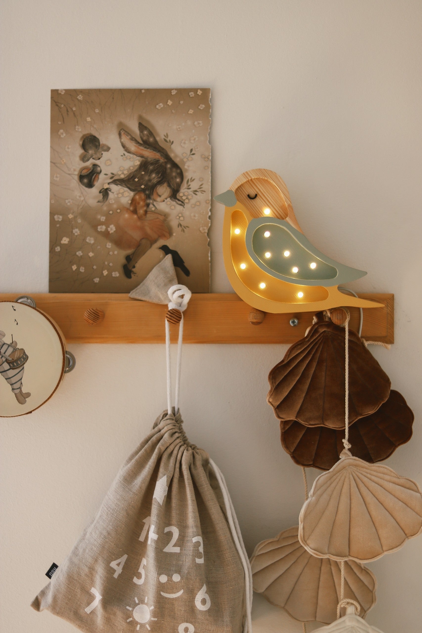 Little Lights mini singing bird shaped wall light