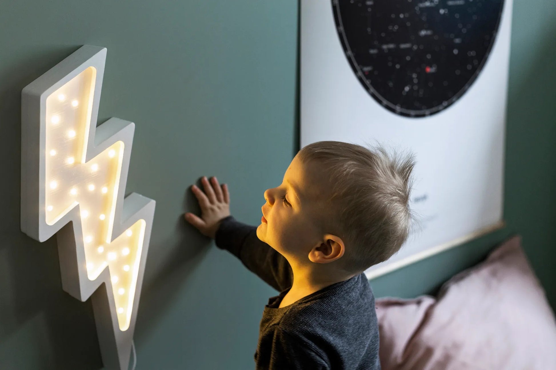 Little Lights Bolt Lamp on with child looking on  - Handmade wooden lightning bolt night light