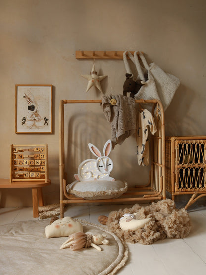 Cozy ambient lighting featuring a cute wooden bunny