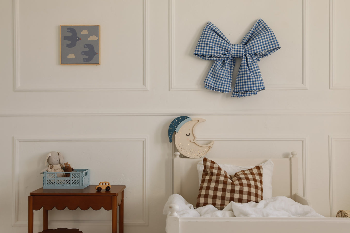 Cozy nursery lighting featuring a smiling moon design