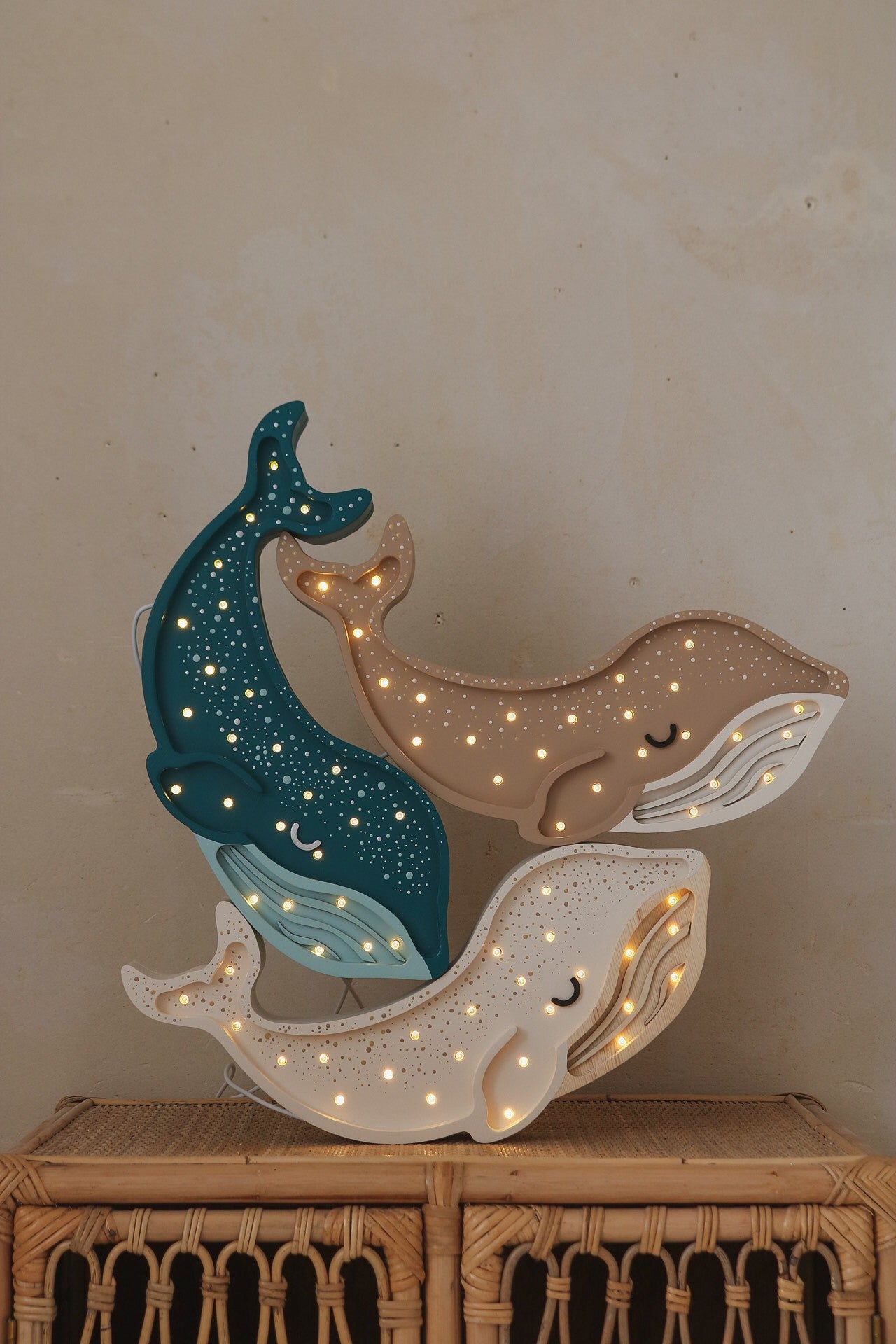 Wooden whale shaped night light for ocean themed nursery 3 colours