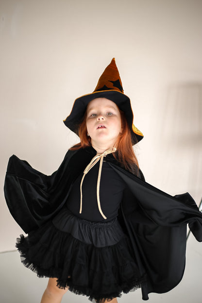 Lifestyle: Enchanted forest play with the Black velvet cape 