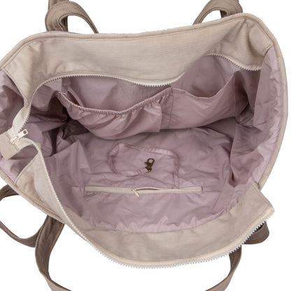 Durable beige cotton fabric with internal pockets and waterproof lining