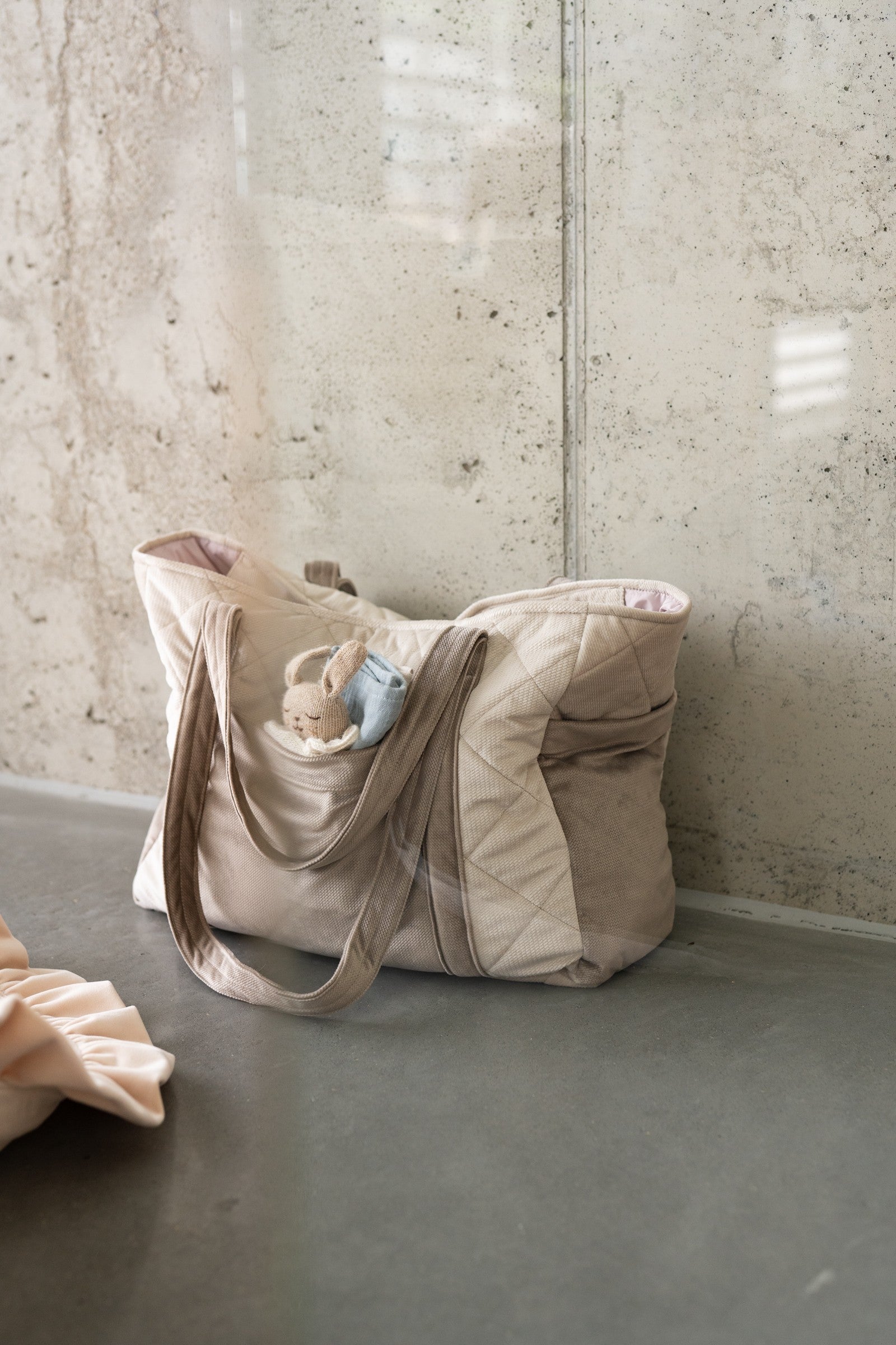 Maternity lifestyle: Beige weekender bag packed for the hospital stay