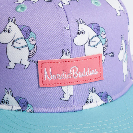 Close-up detail of Moomin Adventure design and fabric texture on lavender kids flat cap | Moomin by Nordicbuddies