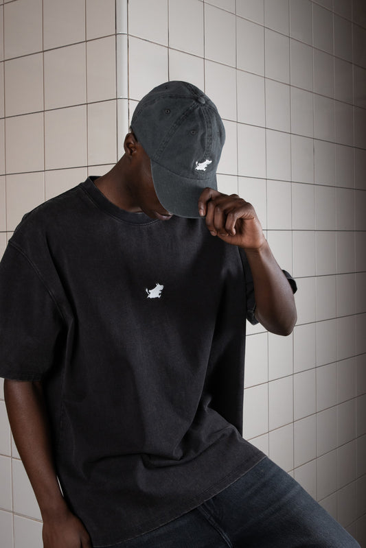 Male model wearing the dark grey Moomin Classics denim dad cap outdoors by Nordicbuddies
