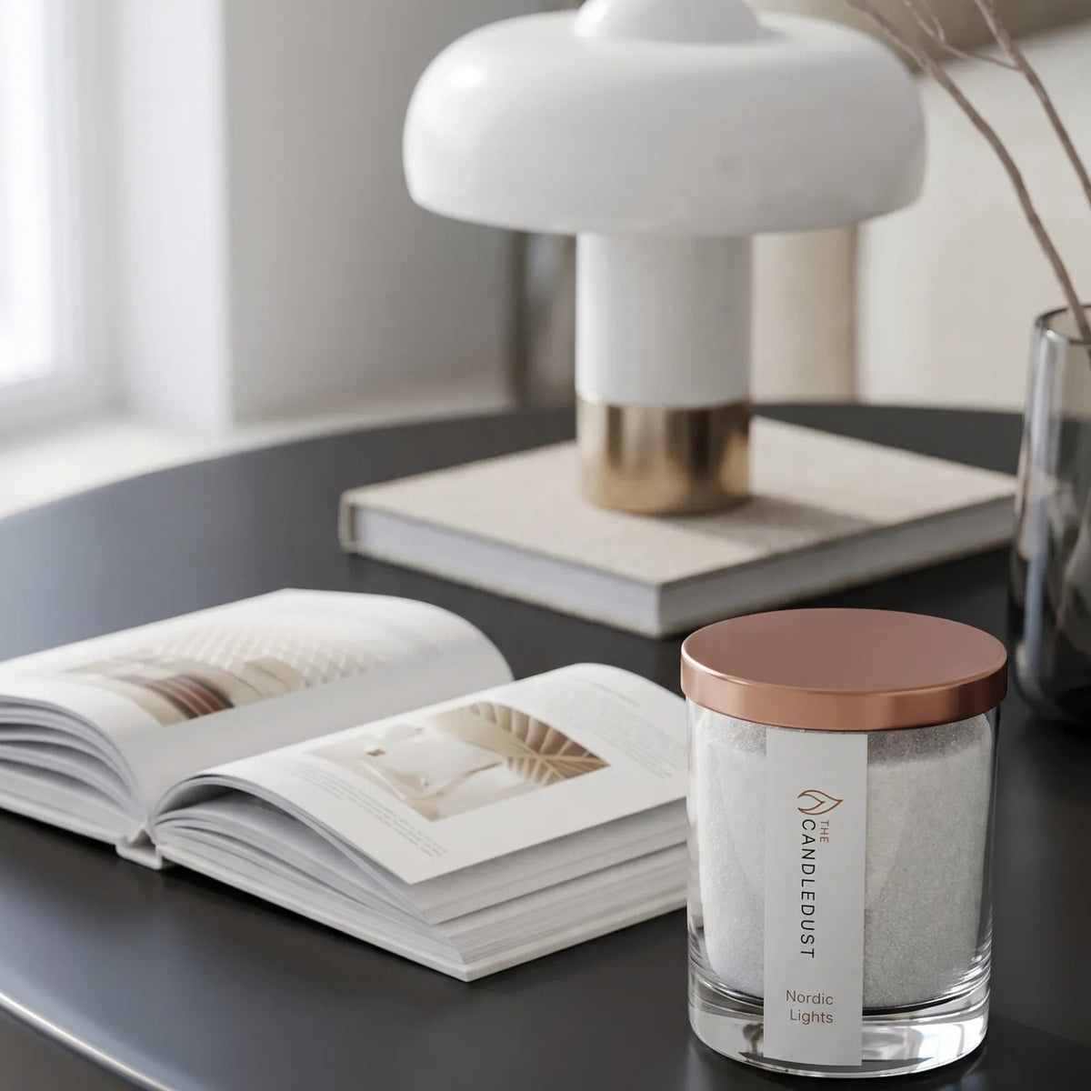 Candledust Nordic Lights fresh scented pearled candle in a 160g transparent glass jar on a wooden table