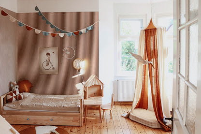 Cosy reading corner: Caramel striped linen canopy with soft floor cushions and toys