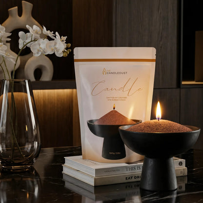 Elegant marble table featuring a center marble tray filled with burning Pecan pearled sand candles