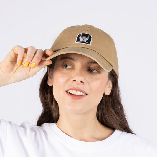 Model wearing the Pippi And The Bang dad cap in casual streetwear style