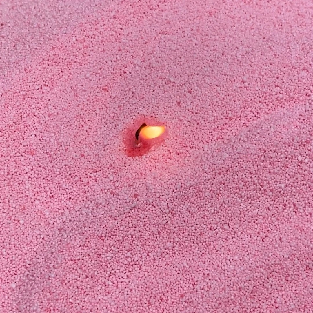 Close-up of vibrant  Dark Baby Pink vegetable wax pearls texture 330g