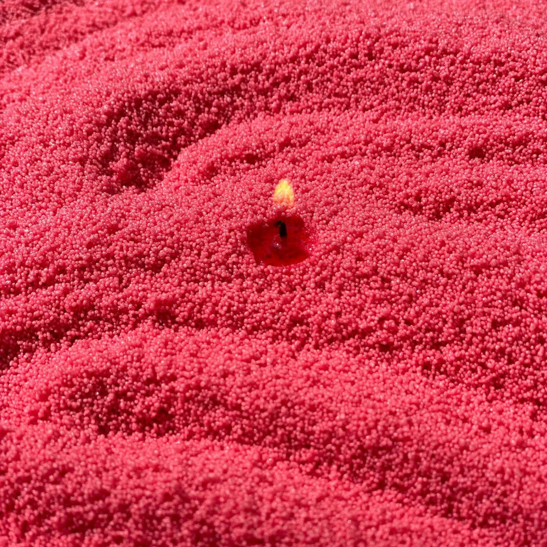 Close-up of vibrant Rasberry vegetable wax pearls texture 330g