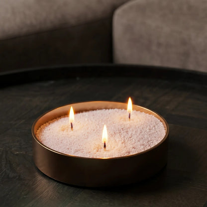 Close-up of a Lit Pumpkin Spice scented pearled sand candle