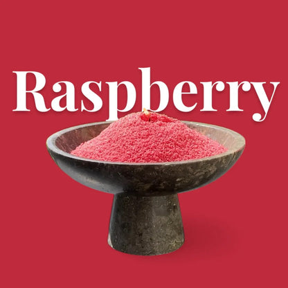 Raspberry text on a matching rich raspberry red background with a glass vase full of unlit pearled candle sand in the foreground