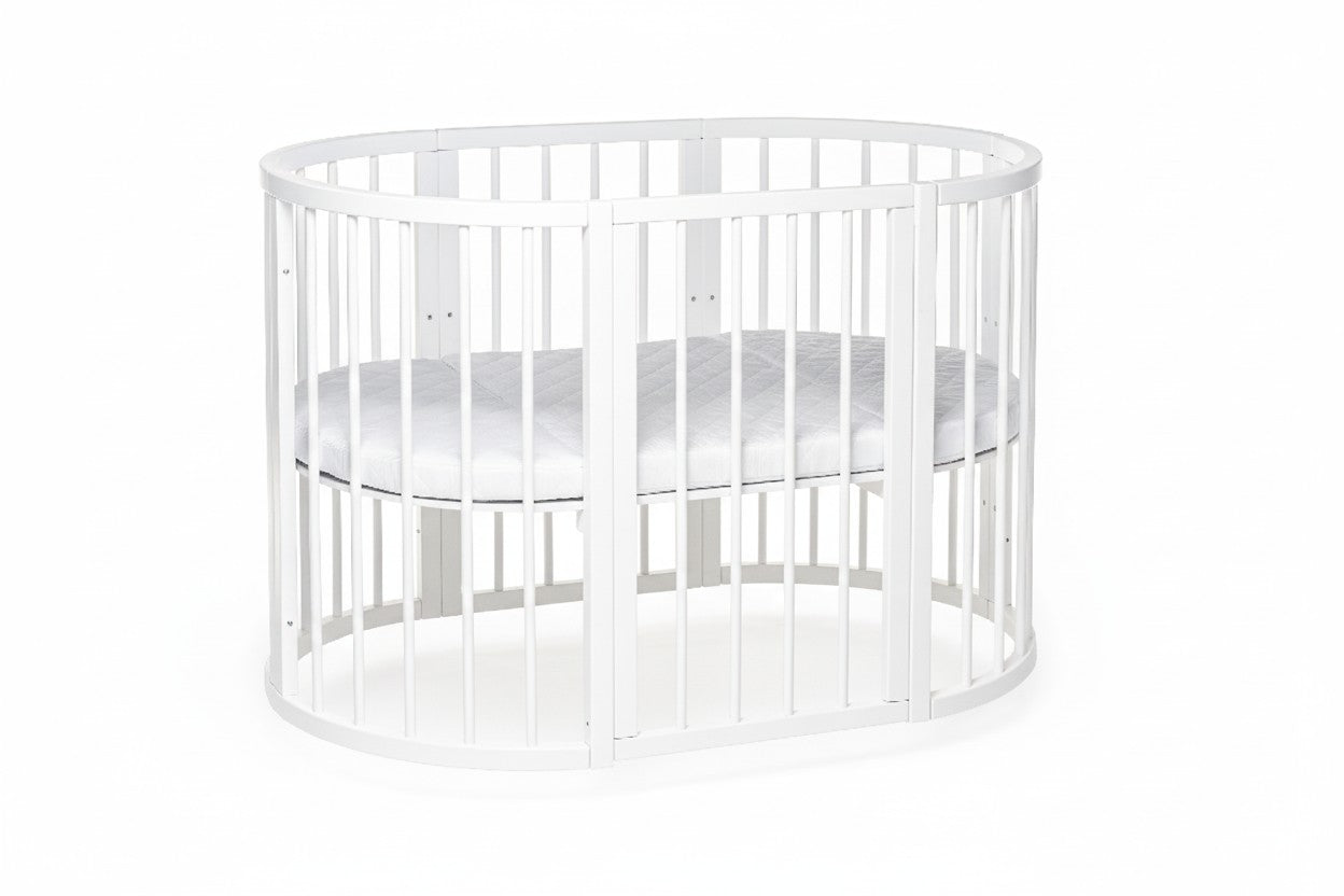 Front perspective of the unique white round nursery bed for newborns - Level 2 -