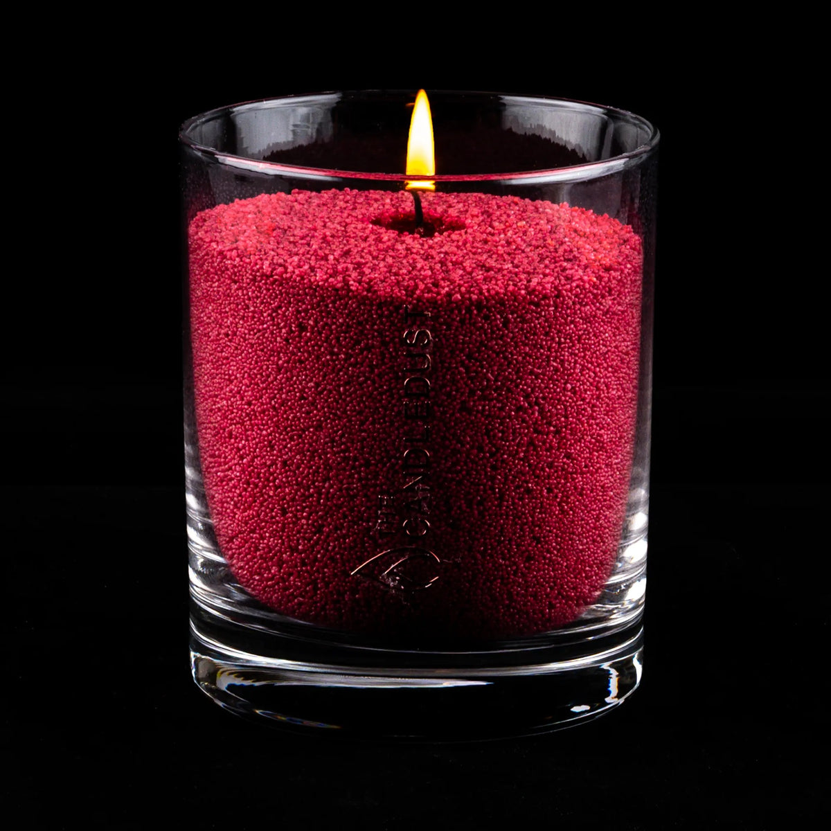 Lit Sangria Red Unscented Candle in Glass, 160g on a black backgroud