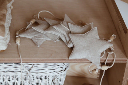 Detail of Moi Mili Sand Star Dust Star Garland - Warm beige hanging bunting with subtle shimmer