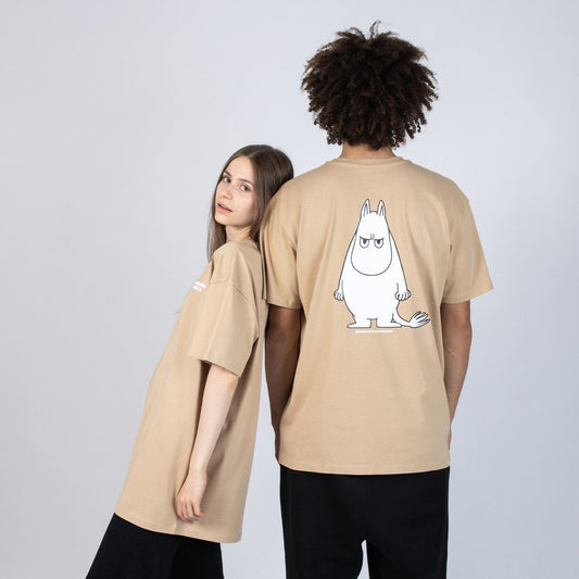 Male and Female models wearing the unisex Moomintroll's Temper T-Shirt Beige - Neutral Scandi style apparel.