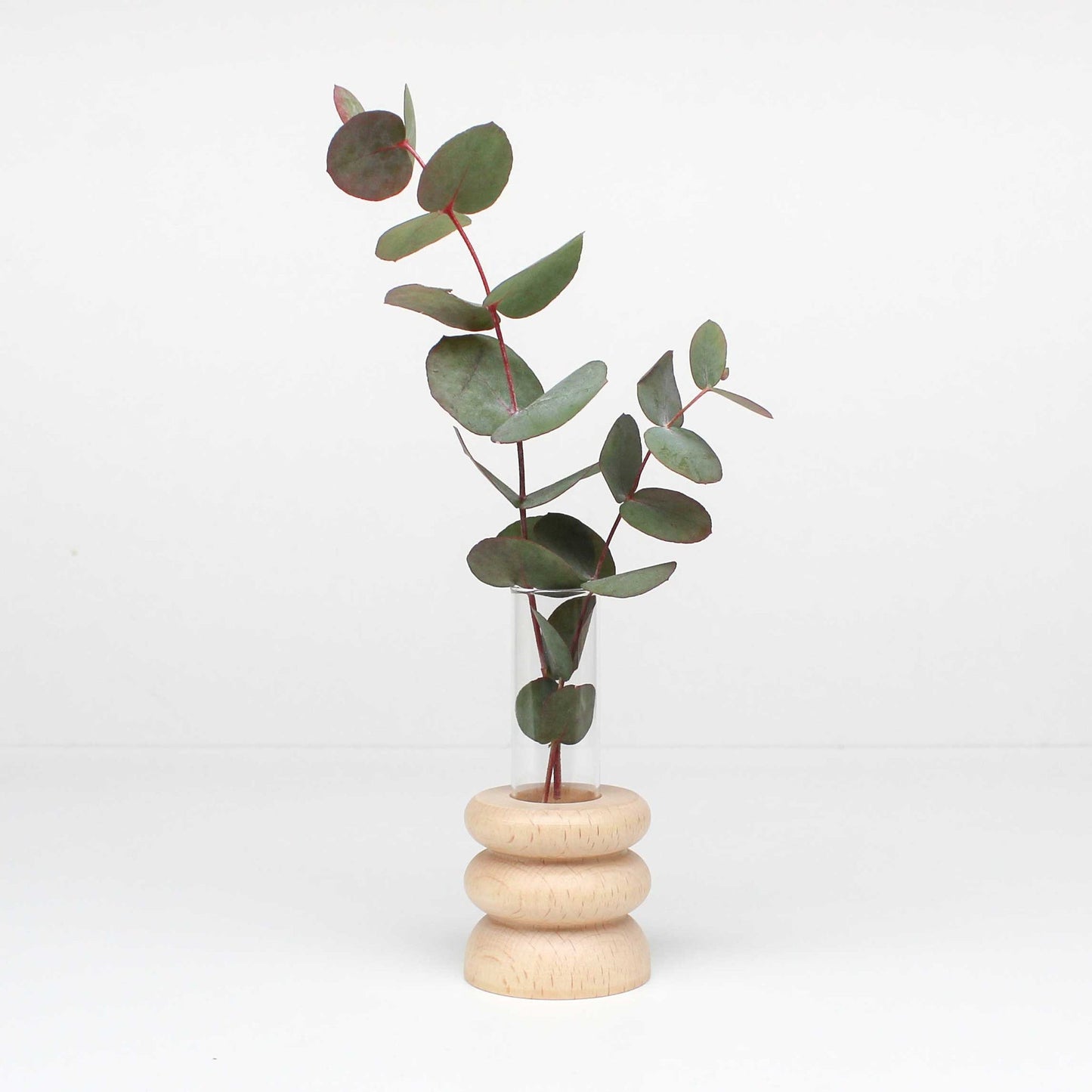 Handcrafted solid wood Totem vase Short Nº 1, inspired by ancestral shapes. Sustainable wooden sculpture made in Portugal by 5mm Paper.