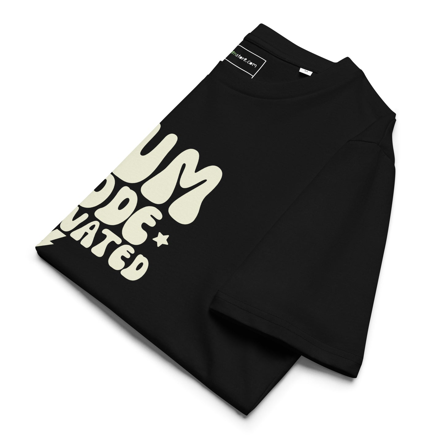 A folded black sustainable t-shirt showcasing the vintage cream MUM MODE ACTIVATED graphic and retro stars.