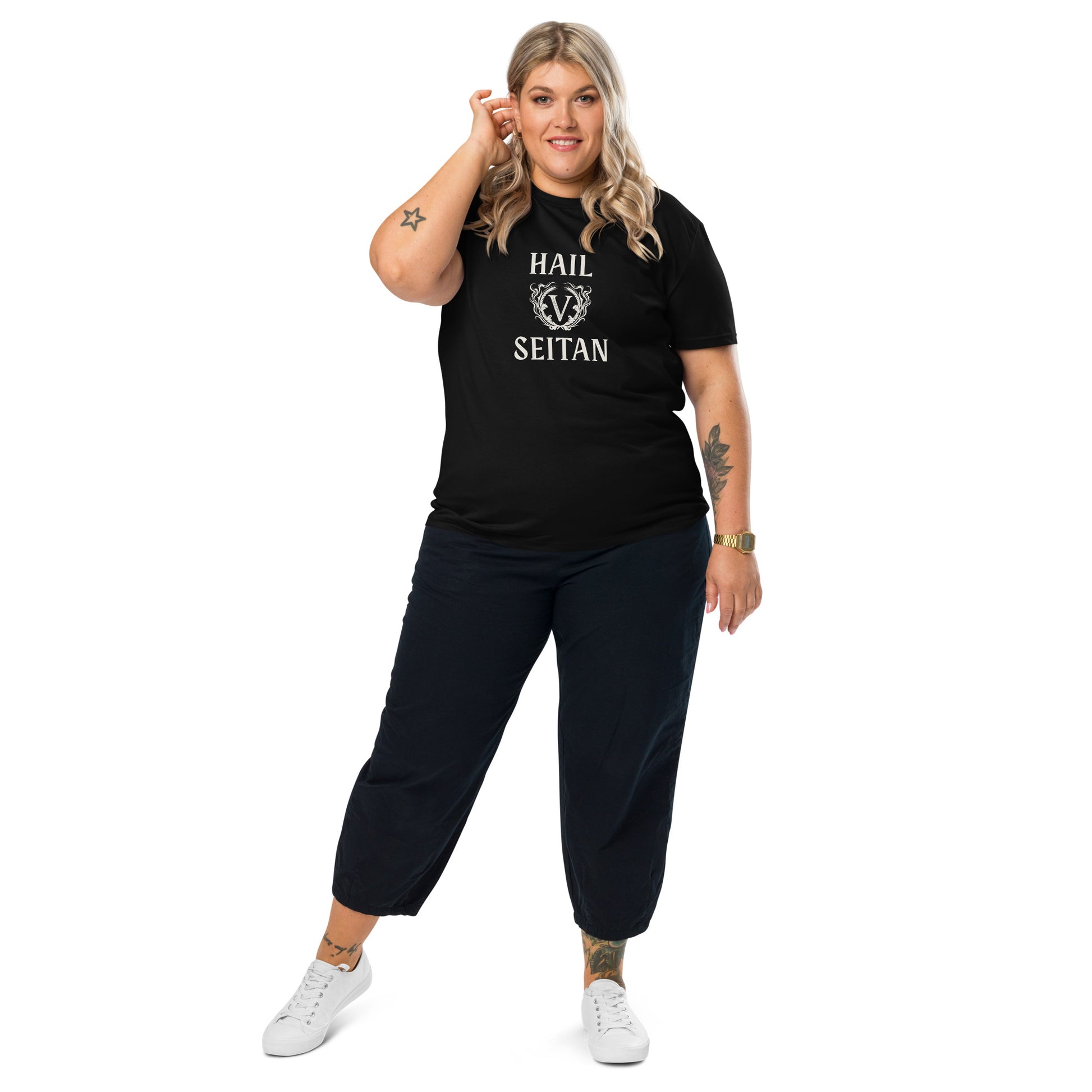 Female model wearing the classic black Hail Seitan graphic t-shirt by That Green Store, featuring a dark aesthetic ivory vegan print.