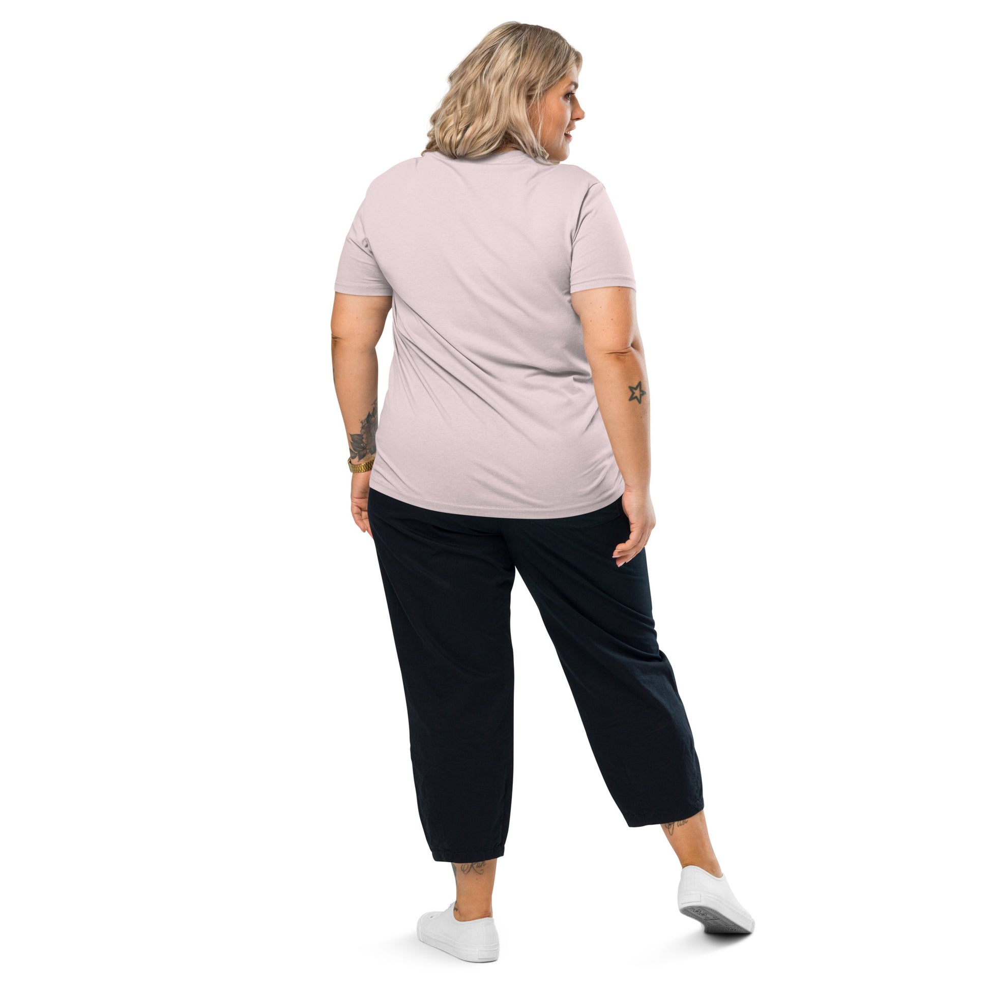 Female model wearing the Technically I'm right organic cotton t-shirt, back view. pink