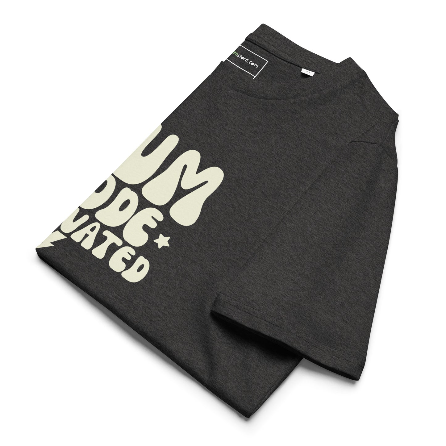 A flat lay photograph of a folded dark heather grey t-shirt with the cream stacked typography reading MUM MODE ACTIVATED.