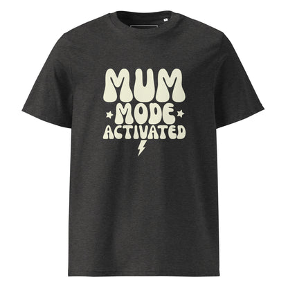 Dark heather grey t-shirt showing a stacked typography design that reads MUM MODE ACTIVATED in a light cream color, with a small lightning bolt.