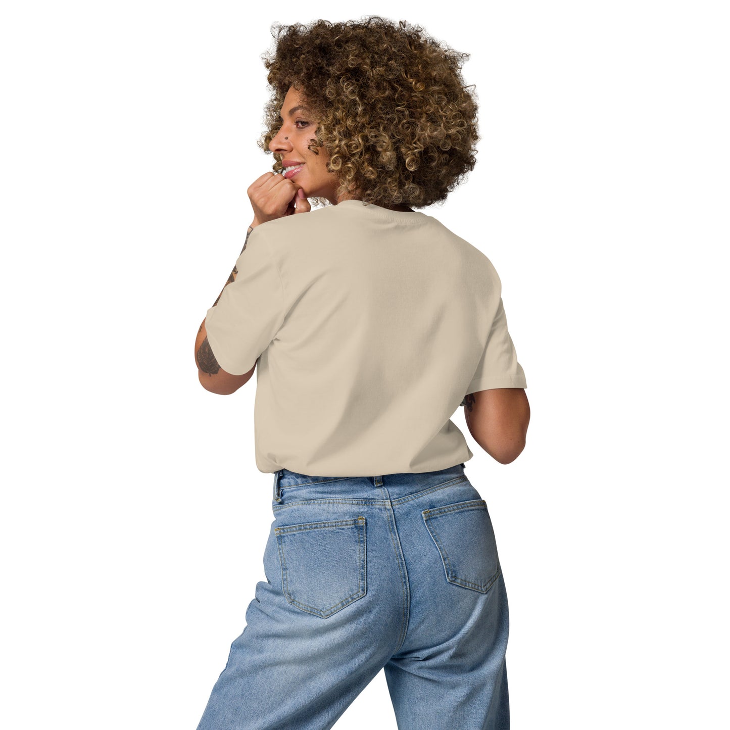 Back view of model posing casually in a sand beige groovy mama tee featuring the MUM MODE ACTIVATED stacked