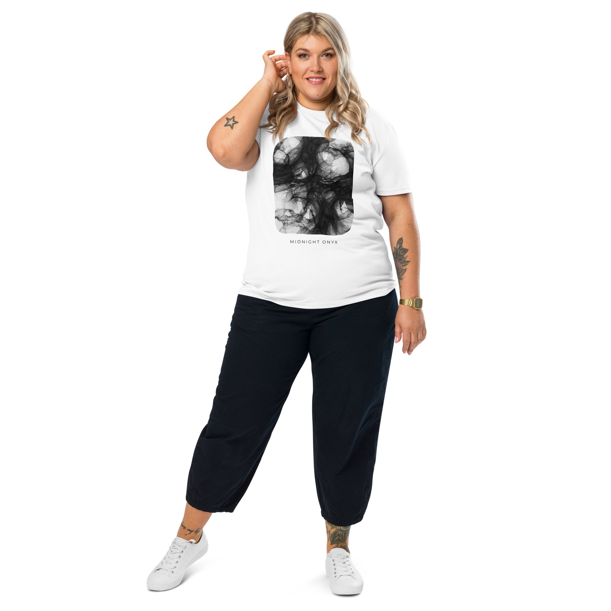 Woman wearing the minimalist white Midnight Onyx graphic t-shirt with dark abstract aesthetic
