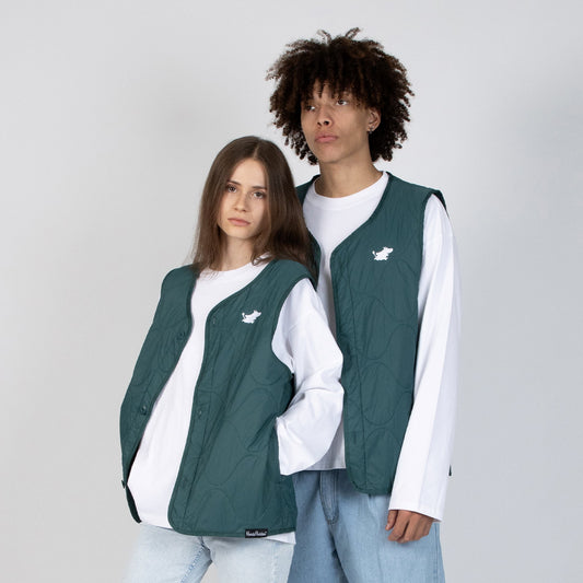 Male and Female Models wearing the green Moomin Classics unisex vest layered over a long-sleeve shirt