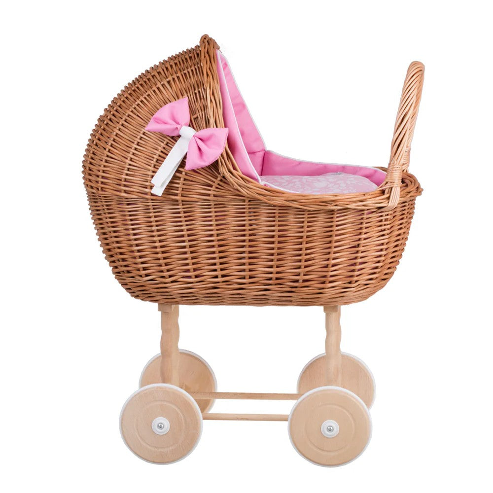 side view Natural wicker doll stroller Lena with pink bedding